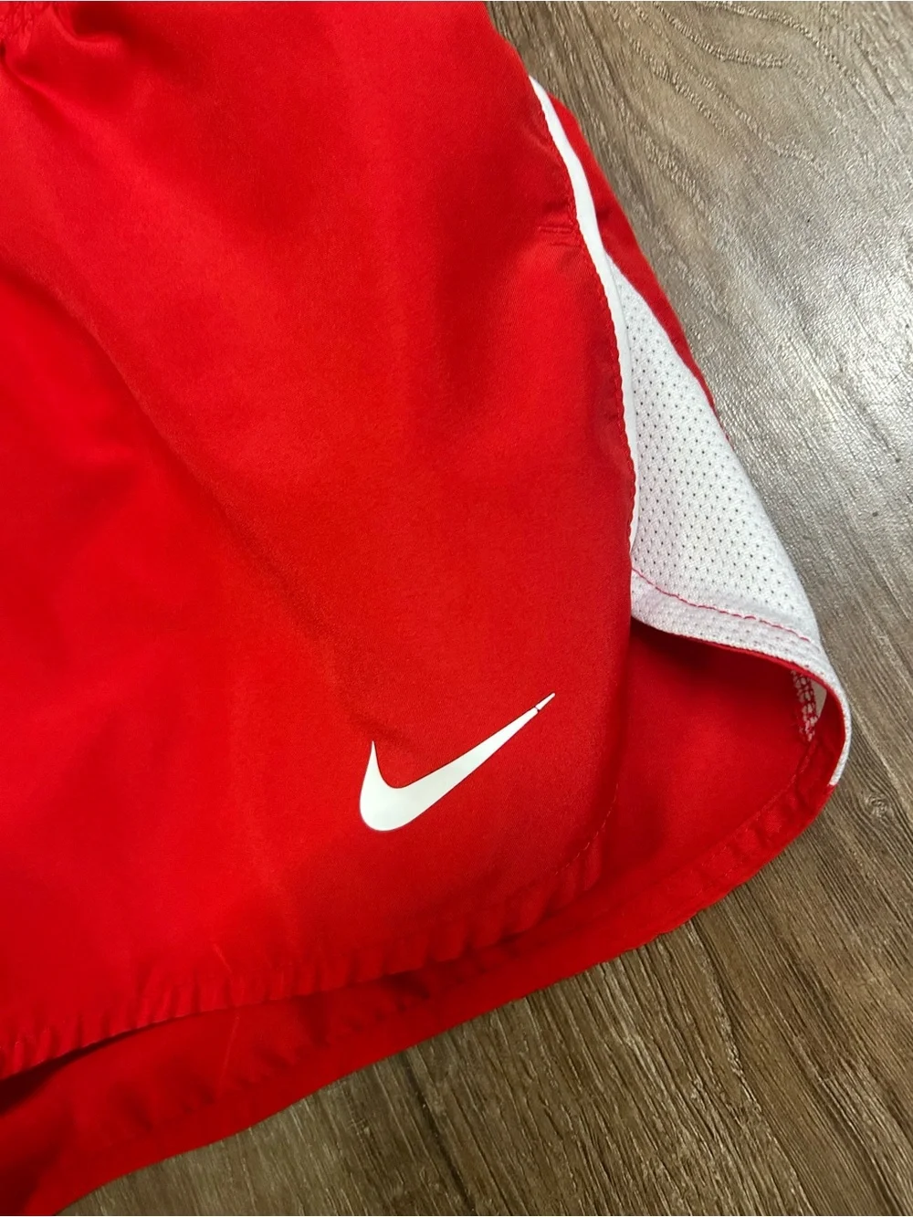 Nike girls Red Running Shorts with White Swoosh